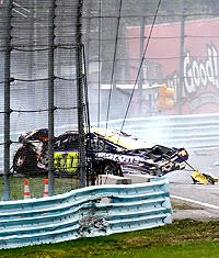 David Reutimann's car ended up a crumpled mess after heavy impact with David Ragan and a retaining wall