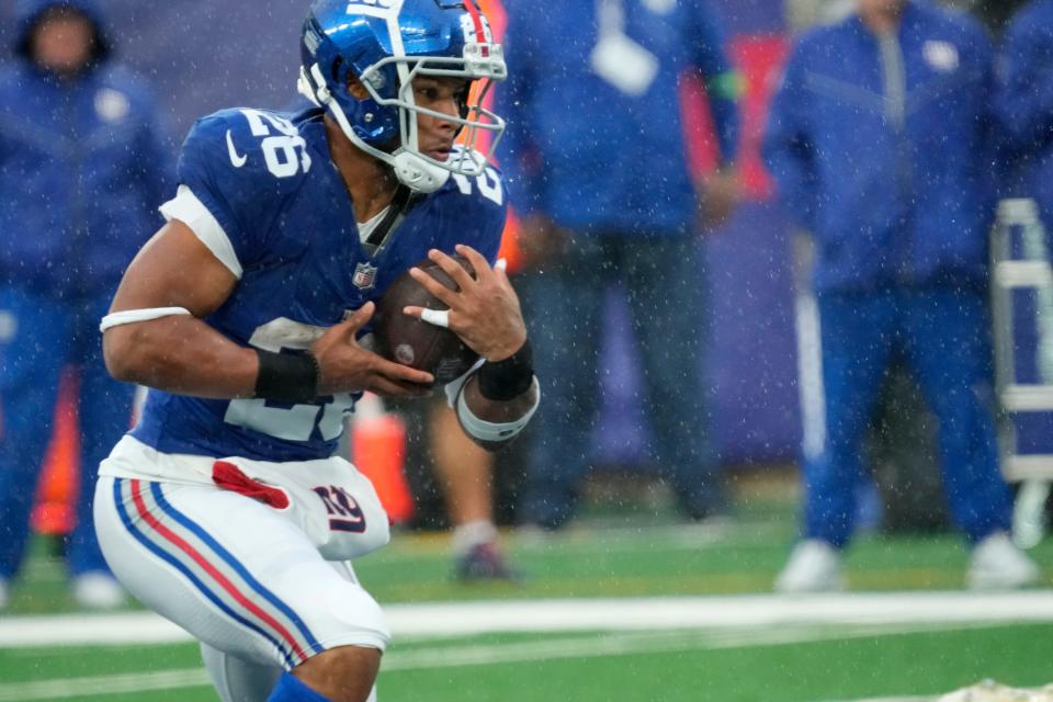 October 29, 2023; East Rutherford, NJ, USA; New York Giants running back Saquon Barkley (26) runs the ball in the second quarter.