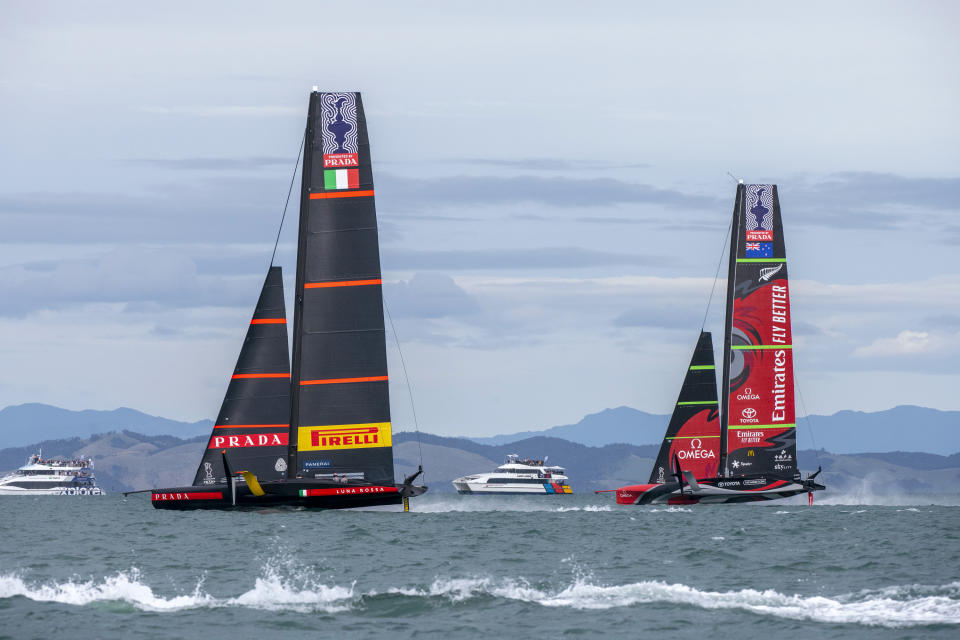 Italy's Luna Rossa, left, and Team New Zealand sail in race two of the America's Cup on Auckland's Waitemata Harbour, Wednesday, March 10, 2021. (Chris Cameron/Photosport via AP)