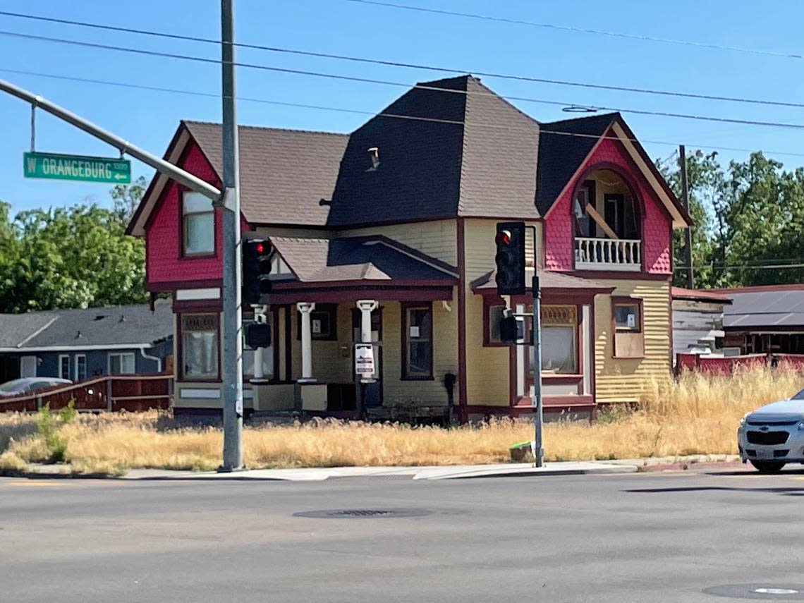 Fire has damaged the front of this run-down Victorian at Tully Road and Orangeburg Avenue in Modesto, May 19, 2023. Garth Stapley/gstapley@modbee.com