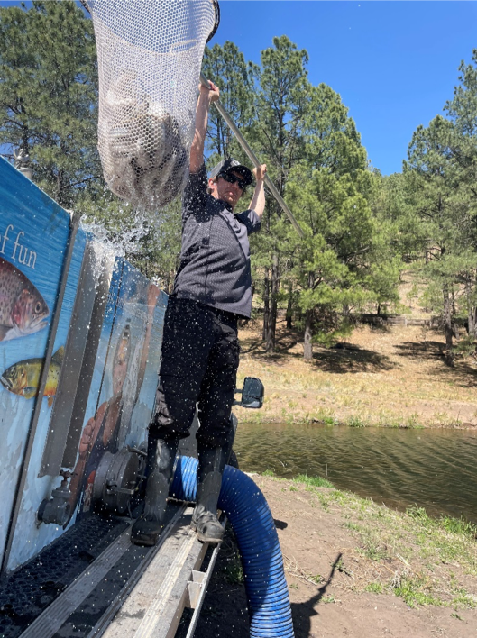 Angler fishing from Lake Bonito. <em>Photo courtesy to the New Mexico Department of Game and Fish</em>.