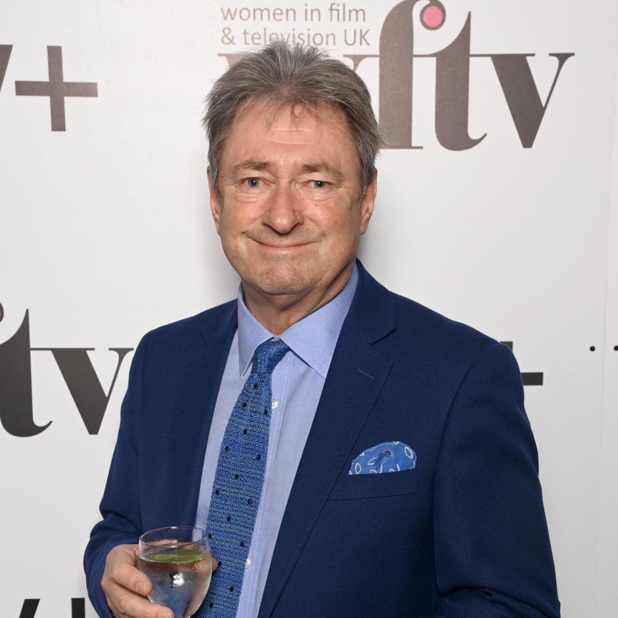  Alan Titchmarsh smiling to the camera. 