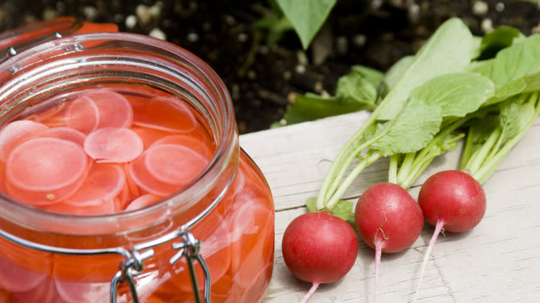 Pickled radishes in jar