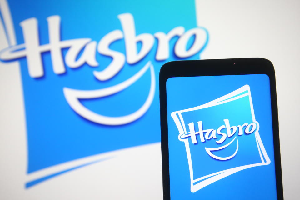 UKRAINE - 2021/03/21: In this photo illustration a Hasbro logo is seen on a smartphone and a pc screen. (Photo Illustration by Pavlo Gonchar/SOPA Images/LightRocket via Getty Images)