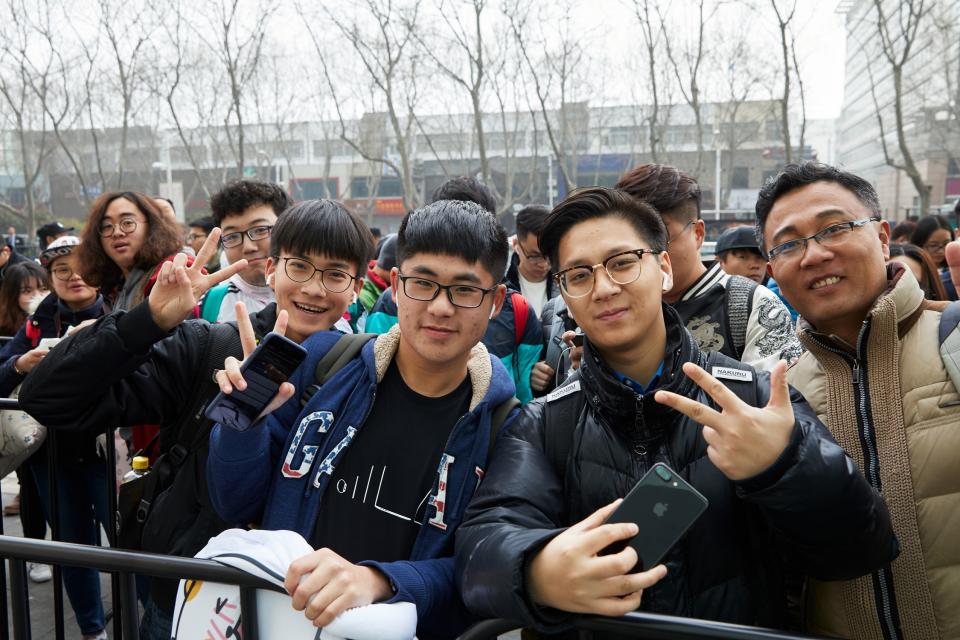 People outside of an Apple store in China.