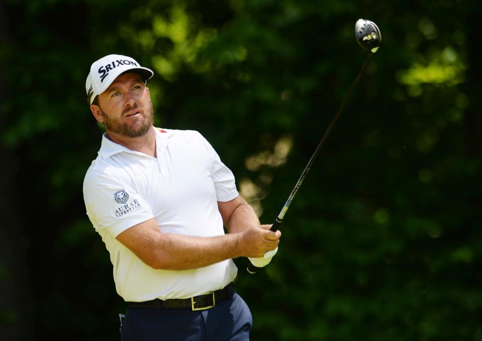 Graeme McDowell, of Northern Ireland, hits his tee shot on the seventh hole during the final round of the Canadian Open golf championship in Ancaster, Ontario, Sunday, June 9, 2019. (Adrian Wyld/The Canadian Press via AP) ORG XMIT: AJW504
