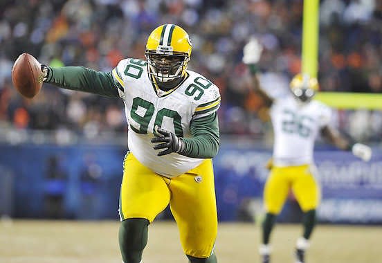 Green Bay defensive tackle B.J. Raji cruises into the end zone with a fourth-quarter interception in the Packers’ 21-14 win over the Chicago Bears in the NFC Championship game.