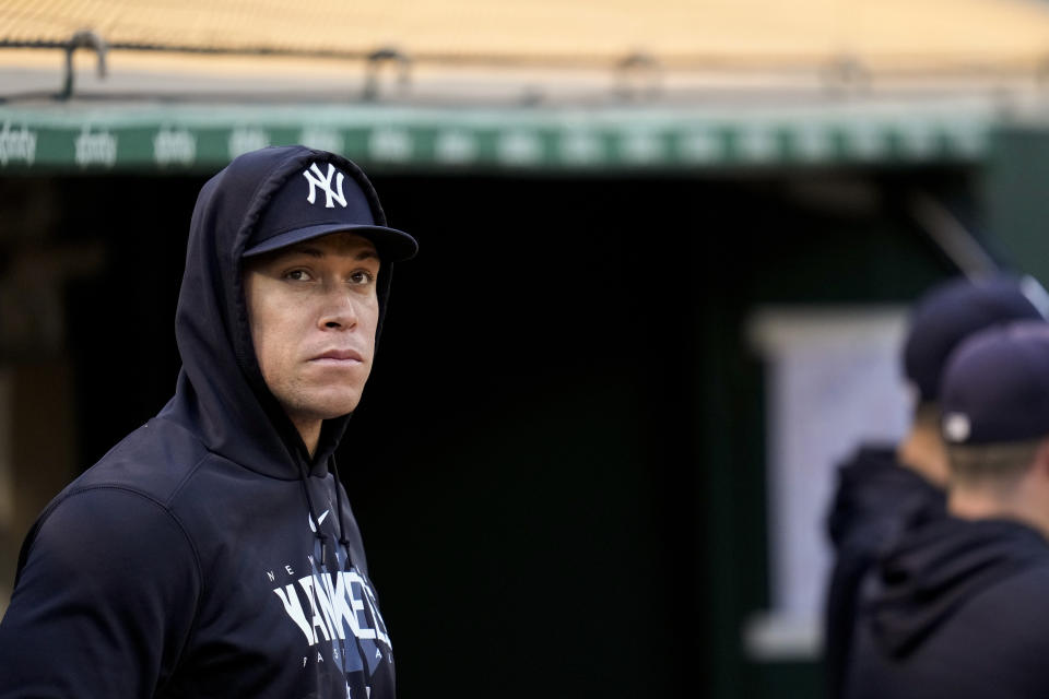 New York Yankees' Aaron Judge watches from the dugout during the fifth inning of the team's baseball game against the Oakland Athletics in Oakland, Calif., Tuesday, June 27, 2023. (AP Photo/Godofredo A. Vásquez)