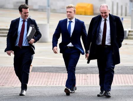 Ulster and Ireland rugby player Stuart Olding arrives at Laganside Court in Belfast, Northern Ireland October 17, 2017. REUTERS/Michael Cooper