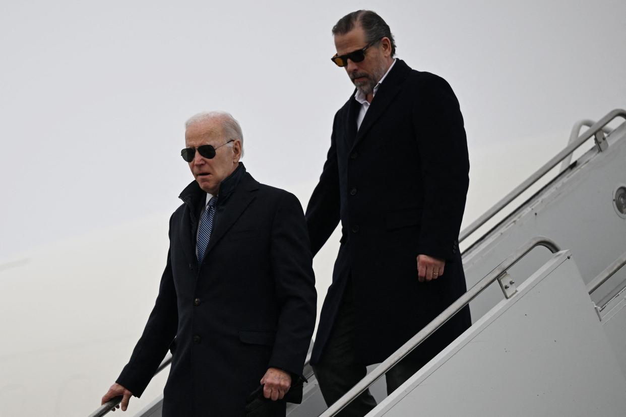 President Joe Biden, with son Hunter Biden, arrives at Hancock Field Air National Guard Base in Syracuse, New York, on February 4, 2023. The US Justice Department on Friday escalated its investigation into President Joe Biden's son Hunter, naming a special counsel amid allegations he engaged in illicit business deals overseas.
