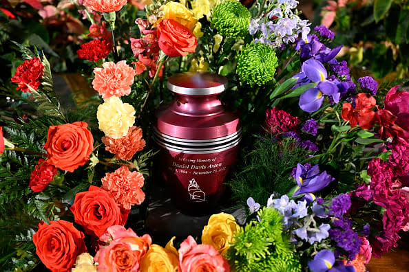 <div class="inline-image__caption"><p>Daniel Aston's ashes are surrounded by flowers during a memorial services at Shove Memorial Chapel on the Colorado College campus on December 7, 2022 in Colorado Springs, Colorado.</p></div> <div class="inline-image__credit">RJ Sangosti/MediaNews Group/The Denver Post via Getty Images</div>