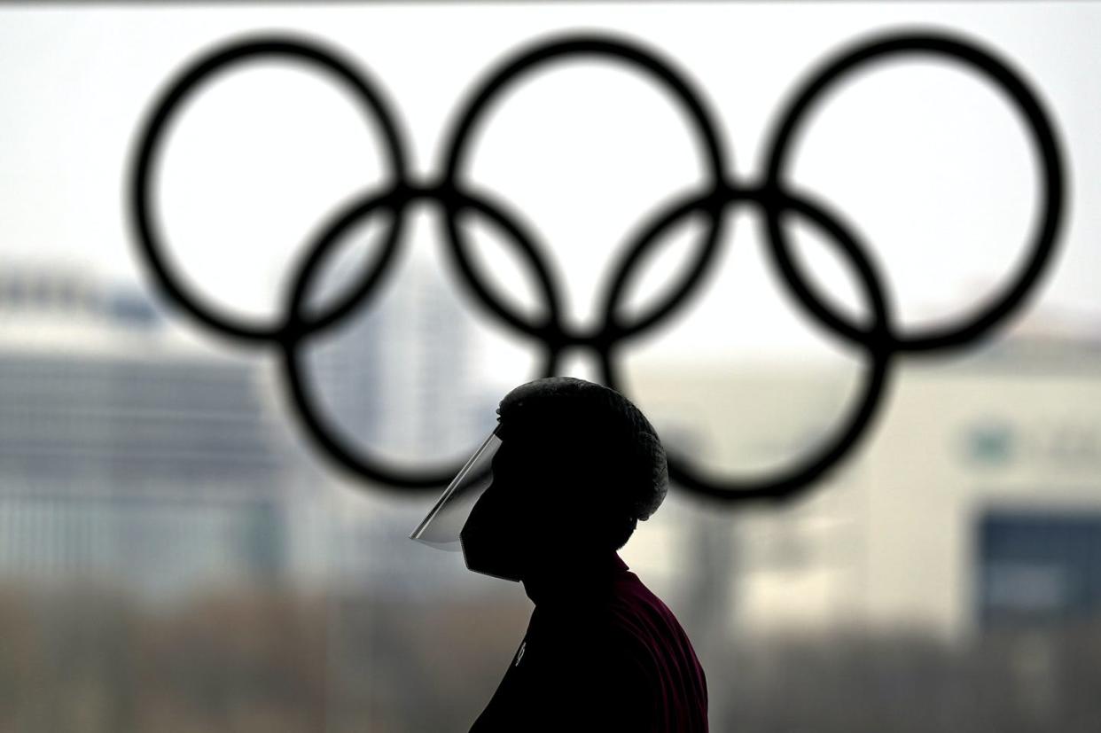 <span class="caption">The International Olympic Committee has a demonstrated history of controlling athletes' public statements, despite claiming that athletes are free to express their opinions in press conferences, in media interviews and on social media.</span> <span class="attribution"><span class="source">(AP Photo/David J. Phillip) </span></span>