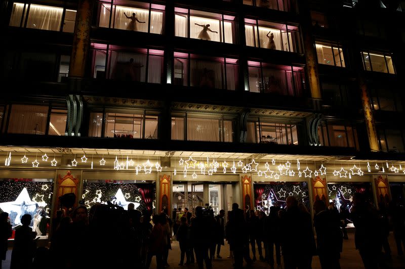 Paris department stores put up their holiday decorations