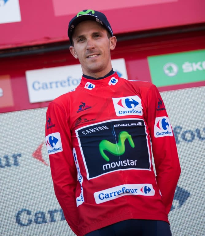 Movistar's cyclist Ruben Fernandez celebrates on the podium on August 22, 2016