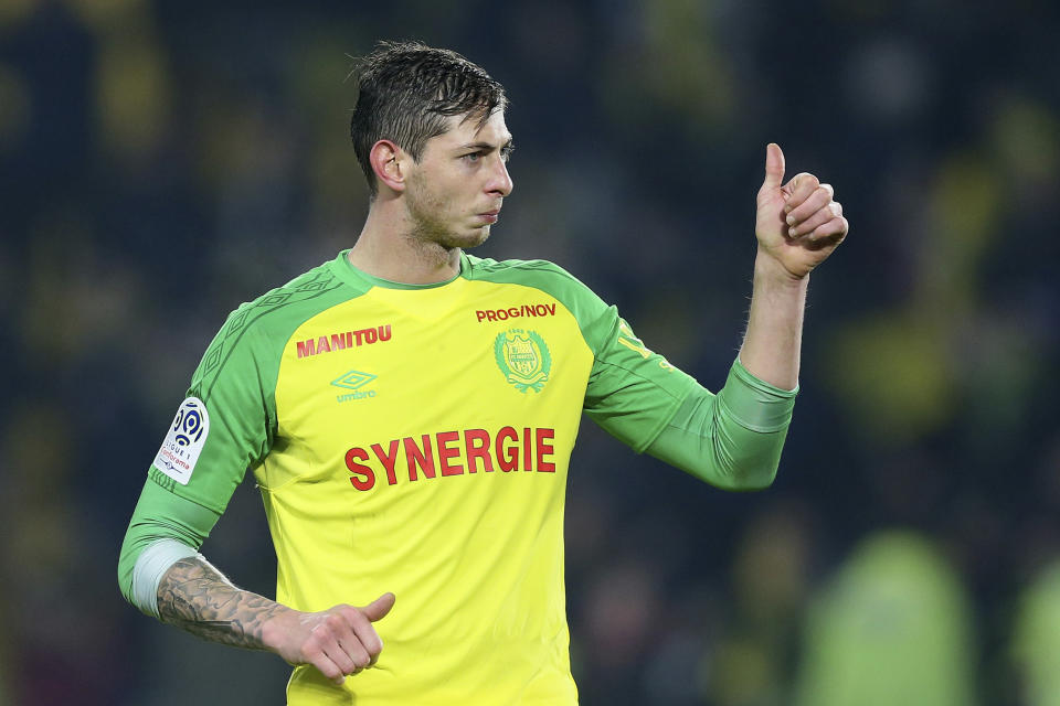 In this his picture taken on Jan. 14, 2018, Argentine soccer player, Emiliano Sala, of the FC Nantes club, western France, gives a thumbs up during a soccer match against PSG in Nantes, France. The French civil aviation authority says Emiliano Sala was aboard a small passenger plane that went missing off the coast of the island of Guernsey. (AP Photo/David Vincent)