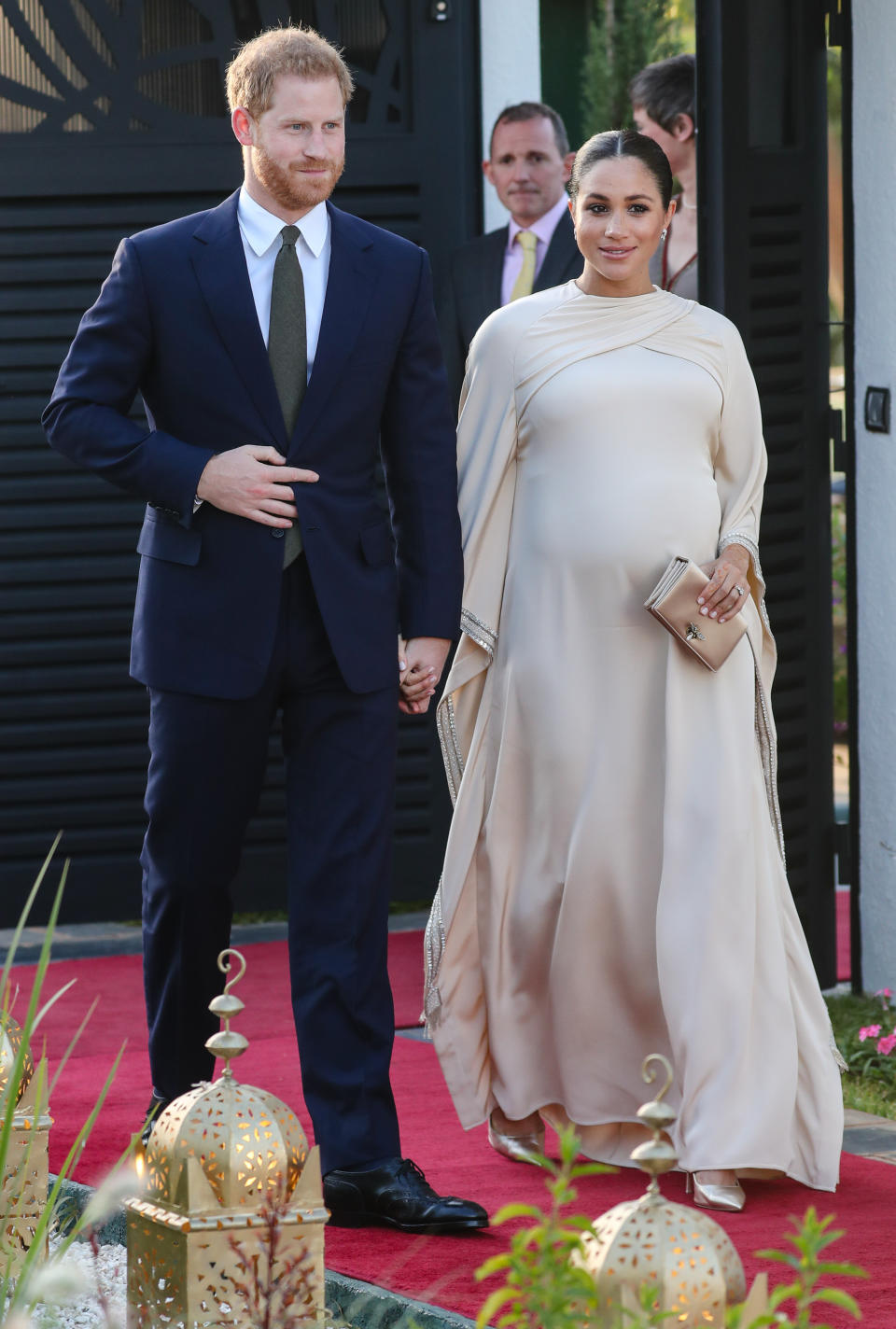 Ahead of the birth of their first child, the couple spent a few days in Morocco. For a reception at the British Ambassador to Morocco's house, Meghan wore a cream, Dior gown. <em>[Photo: Getty]</em>