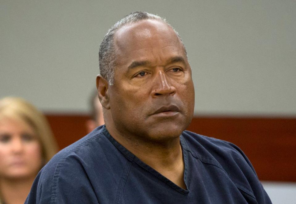 O.J. Simpson listens to audio recording played during an evidentiary hearing for O.J. Simpson in Clark County District Court in Clark County District Court May 16, 2013 (Getty Images)