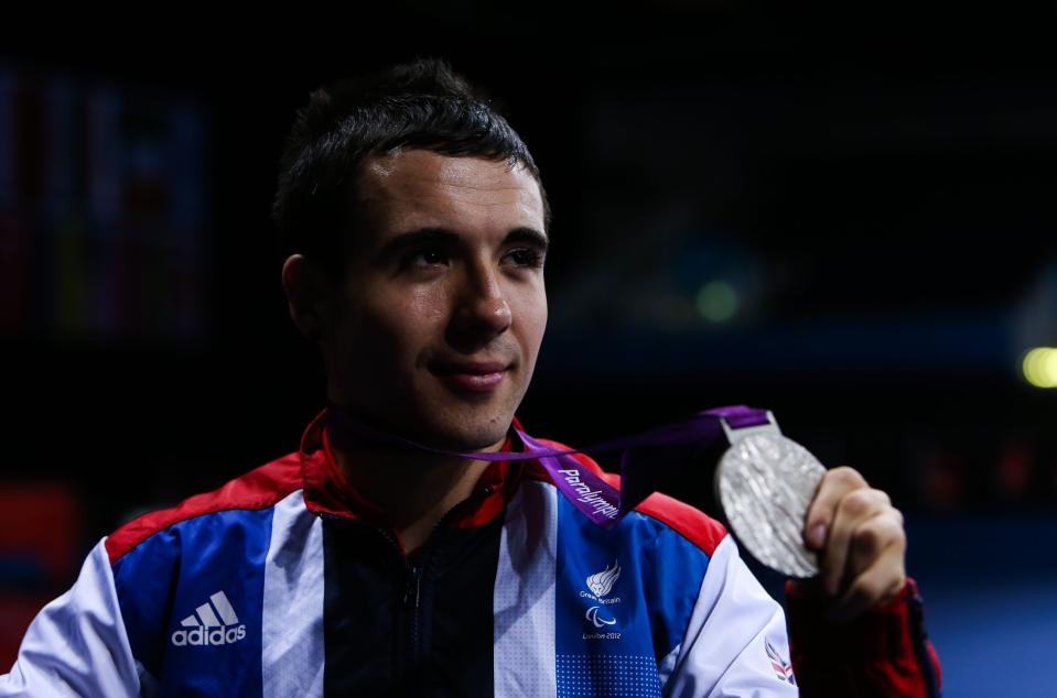 Great Britain's Will Bayley celebrates with his silver medal from the men's single's class 7 gold medal match at the Excel Arena