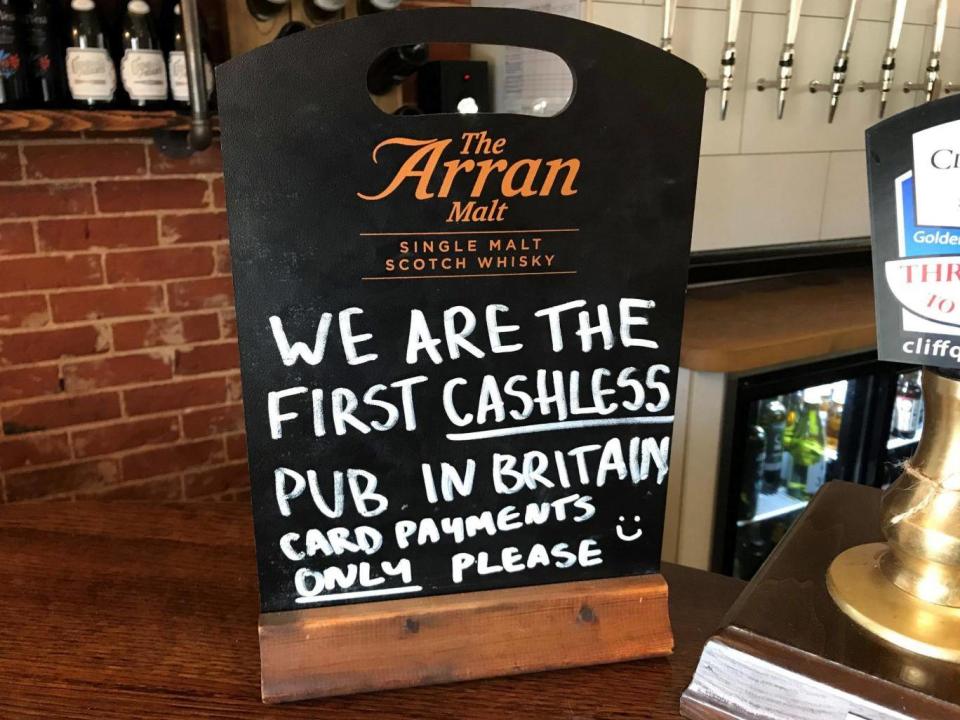 A sign on the bar of the Boot pub in Freston near Ipswich, Suffolk (PA)