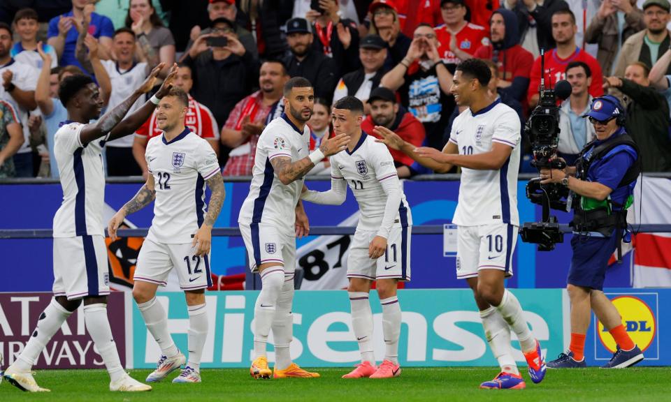 <span>Jude Bellingham (right) celebrates after heading home what proved to be the winner in Gelsenkirchen.</span><span>Photograph: Tom Jenkins/The Guardian</span>