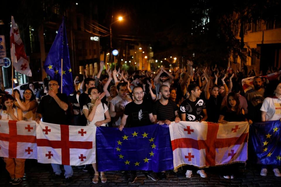 Georgian students protest against a law on ‘foreign agents’ near the Parliament building in Tbilisi, Georgia (EPA)