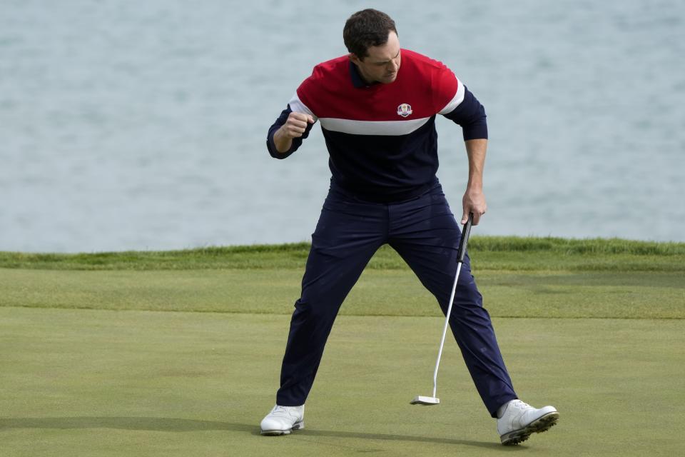 Team USA's Patrick Cantlay reacts to his putt on the third hole during a singles match the Ryder Cup at the Whistling Straits Golf Course Sunday, Sept. 26, 2021, in Sheboygan, Wis. (AP Photo/Charlie Neibergall)