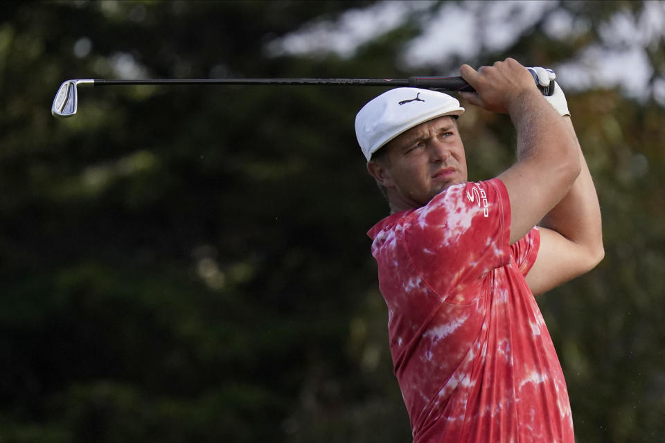 Bryson DeChambeau watches his tee shot on the 11th hole during the second round of the PGA Championship golf tournament at TPC Harding Park Friday, Aug. 7, 2020, in San Francisco. (AP Photo/Jeff Chiu)