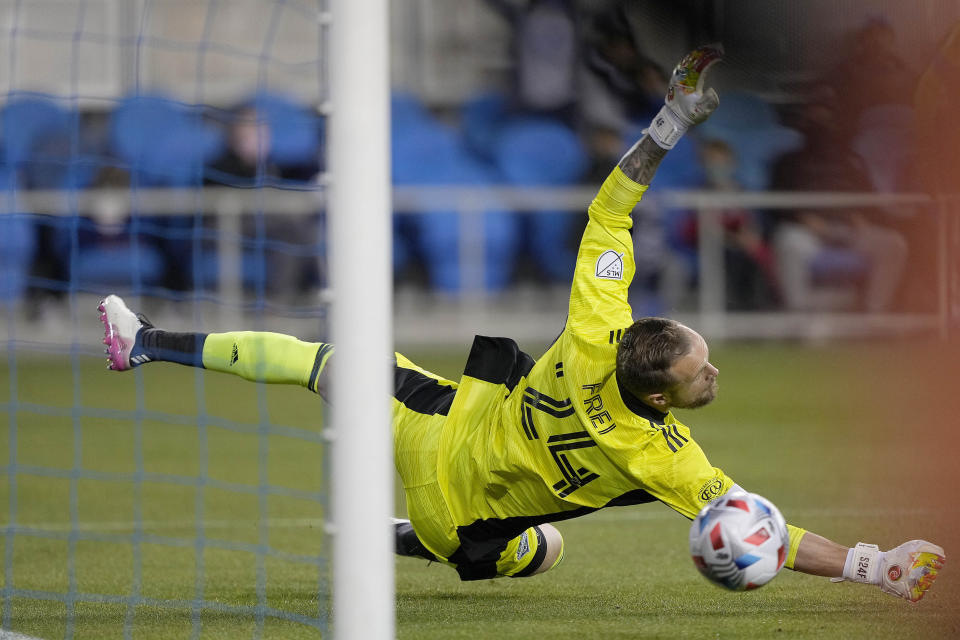 Seattle Sounders goalkeeper Stefan Frei (24) blocks a San Jose Earthquakes shot during the first half of an MLS soccer match Wednesday, May 12, 2021, in San Jose, Calif. (AP Photo/Tony Avelar)