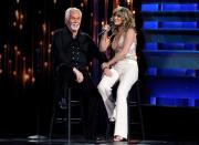 FILE PHOTO: Jennifer Nettles sings a tribute to Kenny Rogers before he receives the Willie Nelson Lifetime Achievement award at the 47th Country Music Association Awards in Nashville