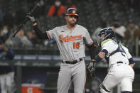 Baltimore Orioles' Trey Mancini (16) reacts after striking out swinging during the third inning of a baseball game against the Seattle Mariners, Monday, May 3, 2021, in Seattle. (AP Photo/Ted S. Warren)