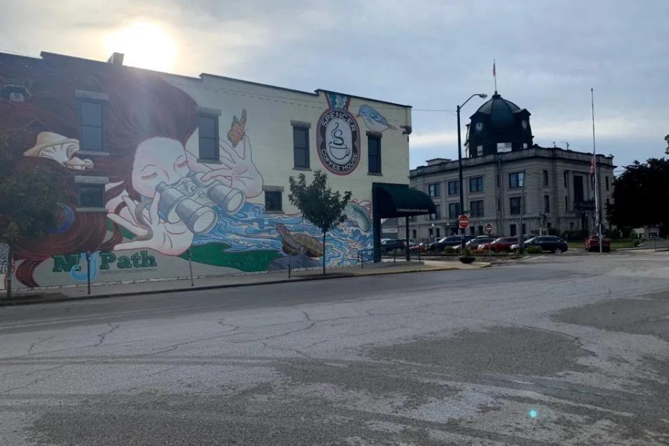 A MYPath mural on the side of a Main Street building in Spencer.