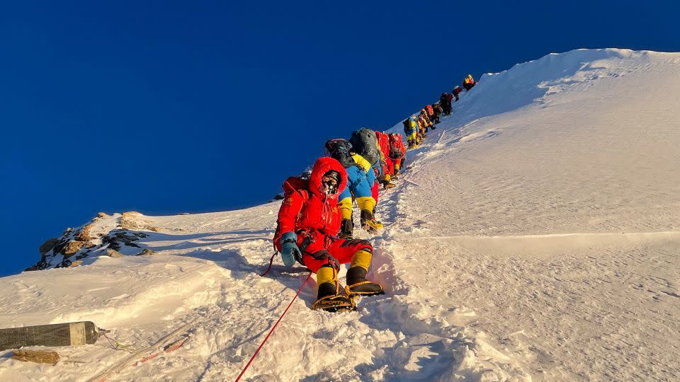 Mountaineers as they climb during their ascend to summit Mount Everest on May 12, 2021. - Pemba Dorje Sherpa/AFP/Getty Images