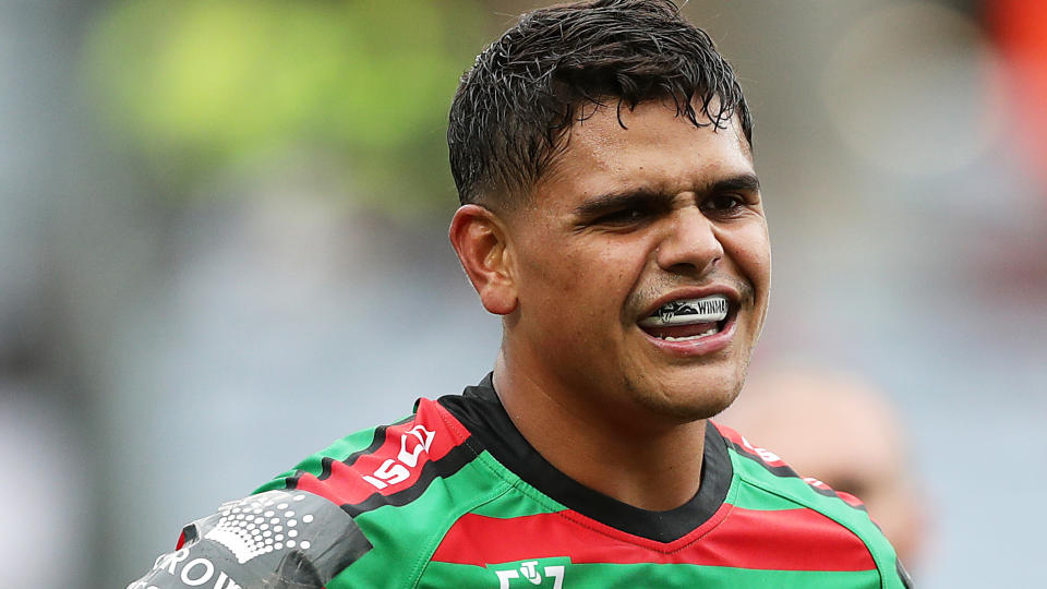 Latrell Mitchell is pictured playing for the South Sydney Rabbitohs.