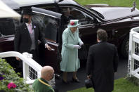 Britain's Queen Elizabeth II, smiles as she arrives, during day five of of the Royal Ascot horserace meeting, at Ascot Racecourse, in Ascot, England, Saturday June 19, 2021. (Steven Paston/PA via AP)