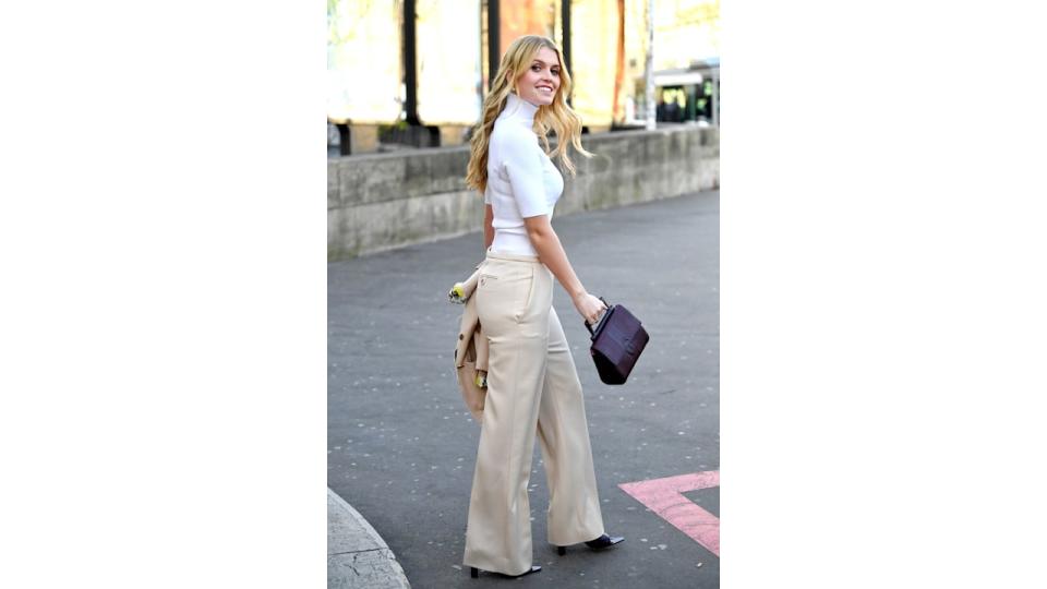 Lady Kitty Spencer in a white top at fashion week