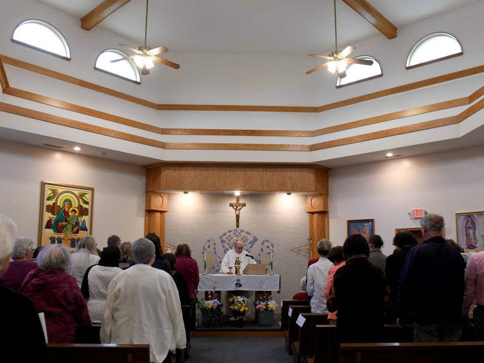 The Rev. Nicholas Mancini celebrates the birthday of Mother Angelica with a Mass and dedication ceremony for a new monument at the St. Raphael Center in Jackson Township.