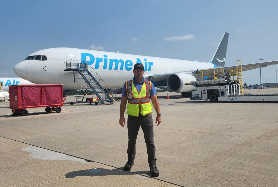 Amazon Air Rockford General Manager Mike Berg walks on the tarmac at Chicago Rockford International Airport Tuesday, July 11, 2023, as Amazon's Prime Day got under way.