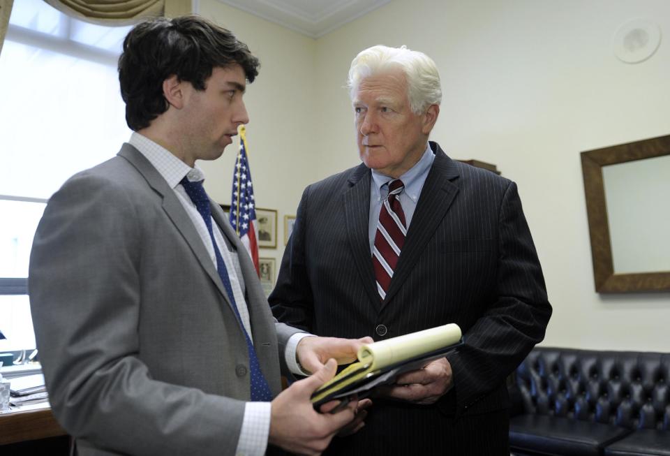 Rep. James Moran, D-Va., right, goes over his schedule with press secretary Thomas Scanlon in his office on Capitol Hill in Washington, Wednesday, Jan. 15, 2014. Moran, a Northern Virginia Democrat, ranking member on the House Appropriations Interior Subcommittee and senior member of the Defense Appropriations Subcommittee, announced that he will not seek re-election. (AP Photo/Susan Walsh)