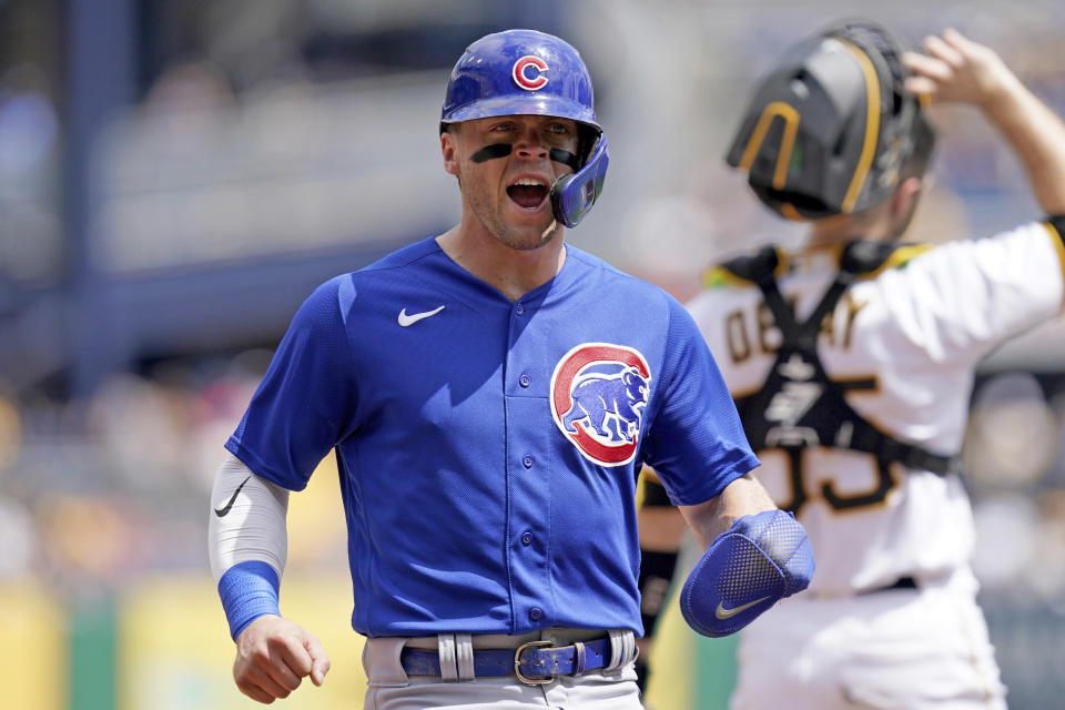 Chicago Cubs' Nico Hoerner reacts as he scores on a single by Cody Bellinger against the Pittsburgh Pirates in the first inning of a baseball game in Pittsburgh, Sunday, Aug. 27, 2023. (AP Photo/Matt Freed)