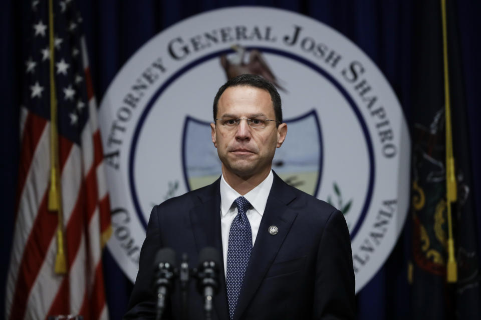 FILE - In this Aug. 14, 2018, file photo, Pennsylvania Attorney General Josh Shapiro walks to the podium to speak about a grand jury's report on clergy abuse in the Roman Catholic Church during a news conference at the Capitol in Harrisburg, Pa. Over the past four months, Roman Catholic dioceses across the U.S. have released the names of more than 1,000 priests and others accused of sexually abusing children in an unprecedented public reckoning spurred at least in part by a shocking grand jury investigation in Pennsylvania, an Associated Press review has found. (AP Photo/Matt Rourke, File)