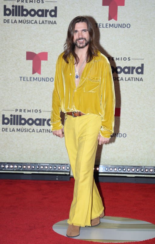 Juanes arrives on the red carpet at the 2021 Latin Billboard Music Awards at the University of Miami, Watsco Center, on September 23 in Coral Gables, Fla. The singer turns 51 on August 9. File Photo by Gary I Rothstein/UPI