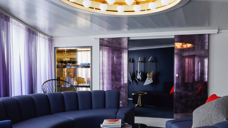 The living room of the Massive Suite is stocked with guitars. - Credit: Courtesy Virgin Voyages