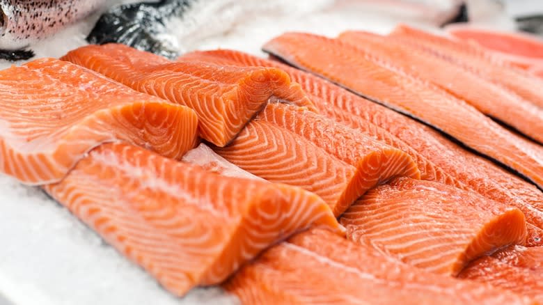 Raw salmon filets on ice 