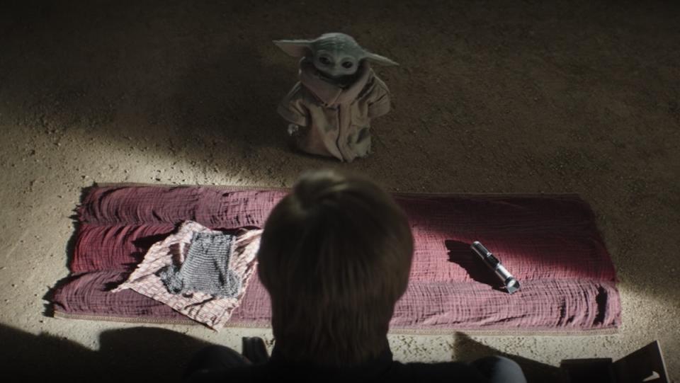 Luke Skywalker tells Grogu he must choose between Din Djarin's chainmal gift and Yoda's lightsaber on The Book of Boba Fett