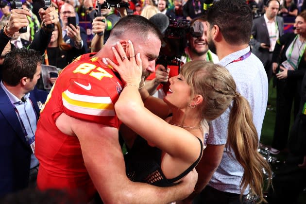 Travis Kelce #87 of the Kansas City Chiefs celebrates with Taylor Swift after defeating the San Francisco 49ers 25-22 in overtime during Super Bowl LVIII at Allegiant Stadium on February 11, 2024 in Las Vegas, Nevada. - Credit: Ezra Shaw/Getty Images