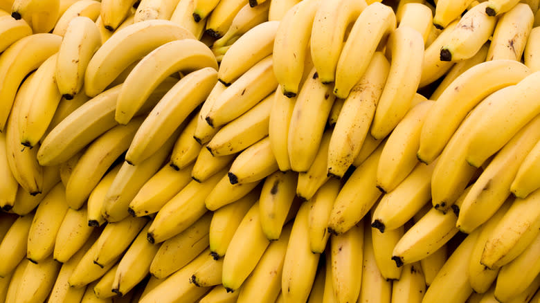 Ripe yellow bananas stacked