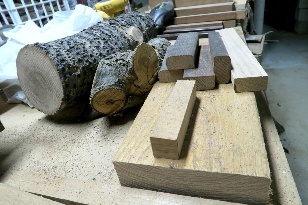 Raw wood waits to be turned into "Exotic Wood Pens" in the basement of Paul DeSaro's Middletown home Tuesday, January 2, 2023. He uses wood sourced from all over the world.