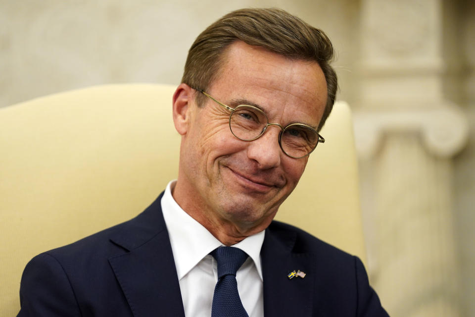 Swedish Prime Minister Ulf Kristersson smiles as he meets with President Joe Biden in the Oval Office of the White House, Wednesday, July 5, 2023, in Washington. (AP Photo/Evan Vucci)