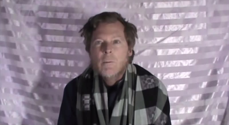 Timothy Weeks speaks to the camera while kept hostage by Taliban insurgents in an unknown location, said to be Afghanistan