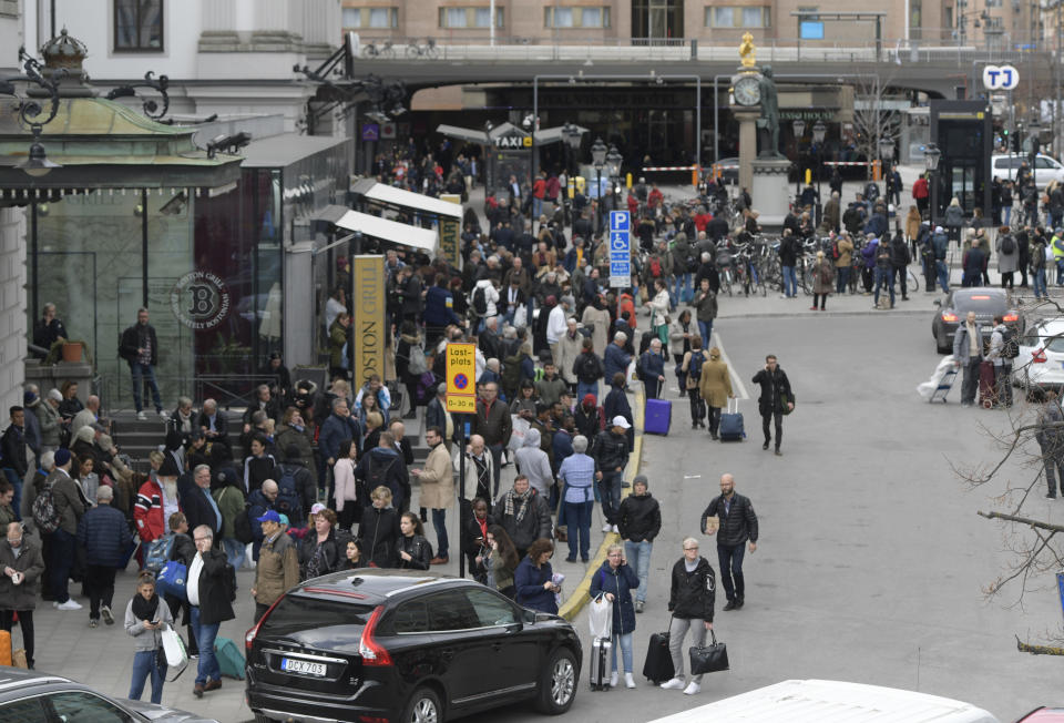 Police evacuate Stockholm Central Train Station after a truck crashed into a department store injuring several people in a different part of Stockholm, Sweden, Friday April 7, 2017. Swedish Prime Minister Stefan Lofven says everything indicates a truck that has crashed into a major department store in downtown Stockholm is "a terror attack." (Anders Wiklund/ TT News Agency via AP)